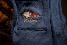 Load image into Gallery viewer, The Polar Express robe. The words "The Polar Express" are embroidered on upper left while the right bottom pocket features a bell design and "Believe" bell embroidery
